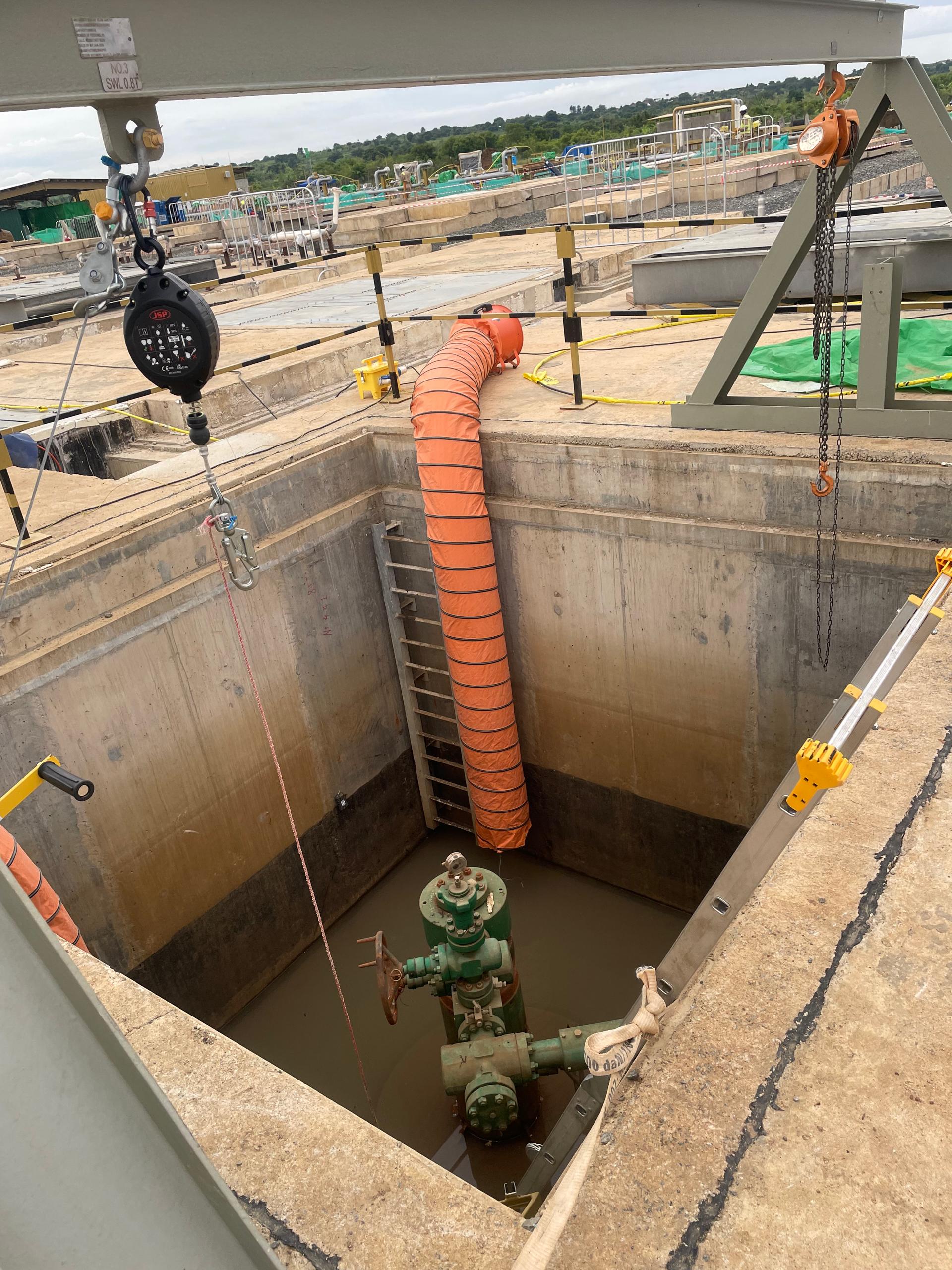 Field personnel carrying out controlled work at an industrial project site
